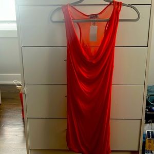 Beautiful long orange blouse, perfect for the summer.